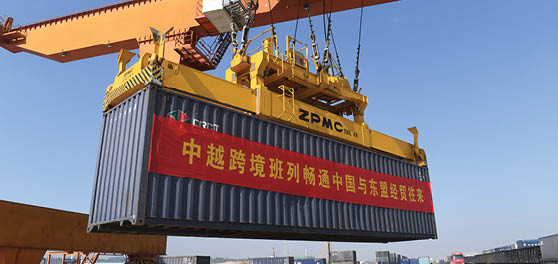 (210911) -- NANNING, Sept. 11, 2021 (Xinhua) -- A crane transfers a container at a railway port in Nanning, south China's Guangxi Zhuang Autonomous Region, Nov. 11, 2020. Since China and ASEAN established dialogue relations in 1991, the two sides have remained committed to promoting regional development and prosperity with comprehensive cooperation and bringing tangible benefits to people in the region. (Xinhua/Lu Boan)